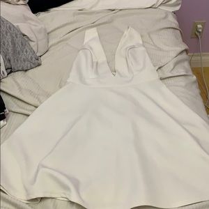Deep V white mini dress